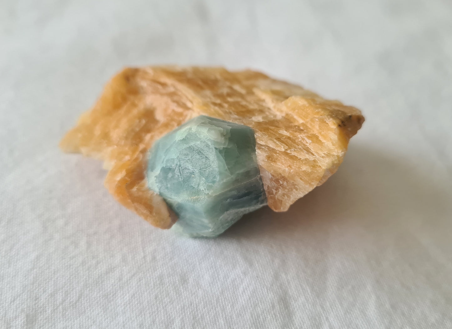 Blue apatite and calcite crystal