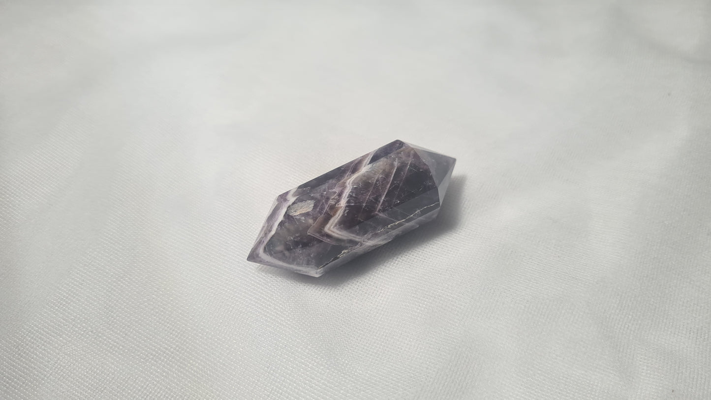 Améthyste taillée 12 facettes 5.5x2cm