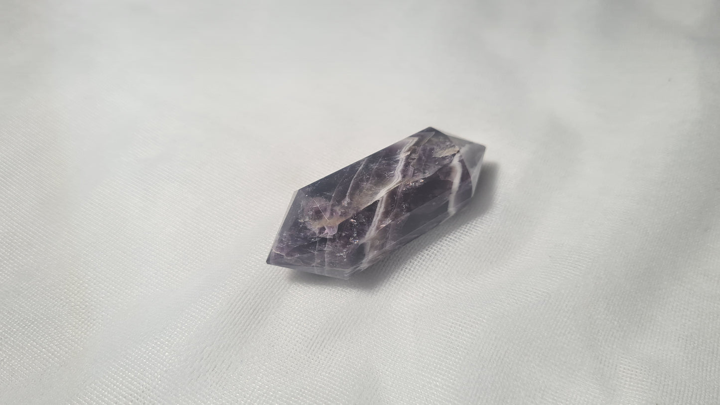 Améthyste taillée 12 facettes 5.5x2cm
