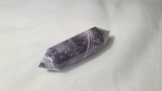 Améthyste taillée 12 facettes 6.7x2cm